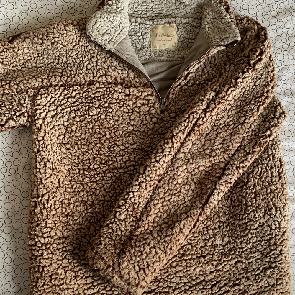 Womens sweater runs large
